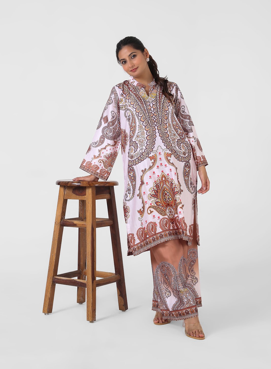 paisley print co‑ord set, satin feel kurta pants set, women’s printed kurta with wide leg pants, travel friendly outfit for women, mandarin collar kurta set, border print co‑ord, lightweight statement set.