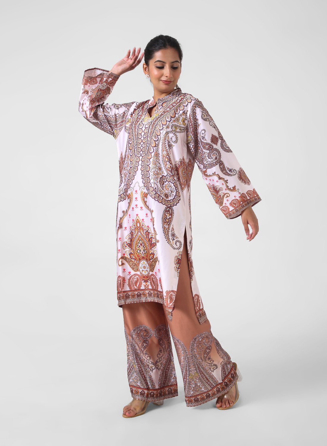 paisley print co‑ord set, satin feel kurta pants set, women’s printed kurta with wide leg pants, travel friendly outfit for women, mandarin collar kurta set, border print co‑ord, lightweight statement set.