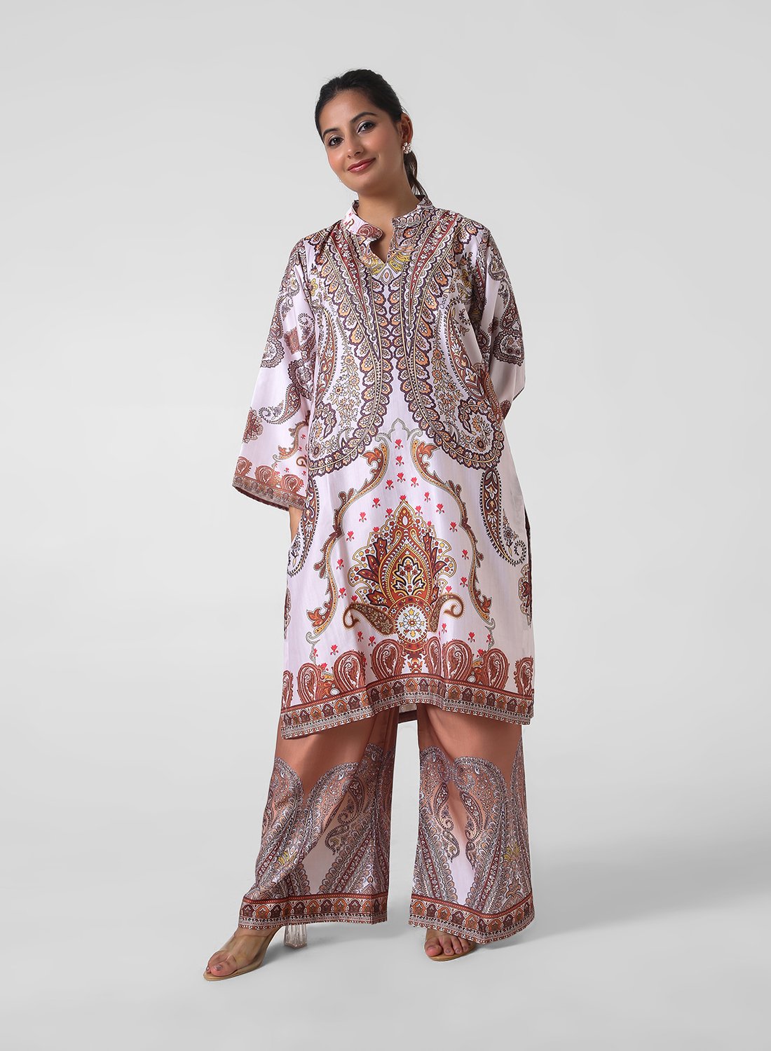 paisley print co‑ord set, satin feel kurta pants set, women’s printed kurta with wide leg pants, travel friendly outfit for women, mandarin collar kurta set, border print co‑ord, lightweight statement set.