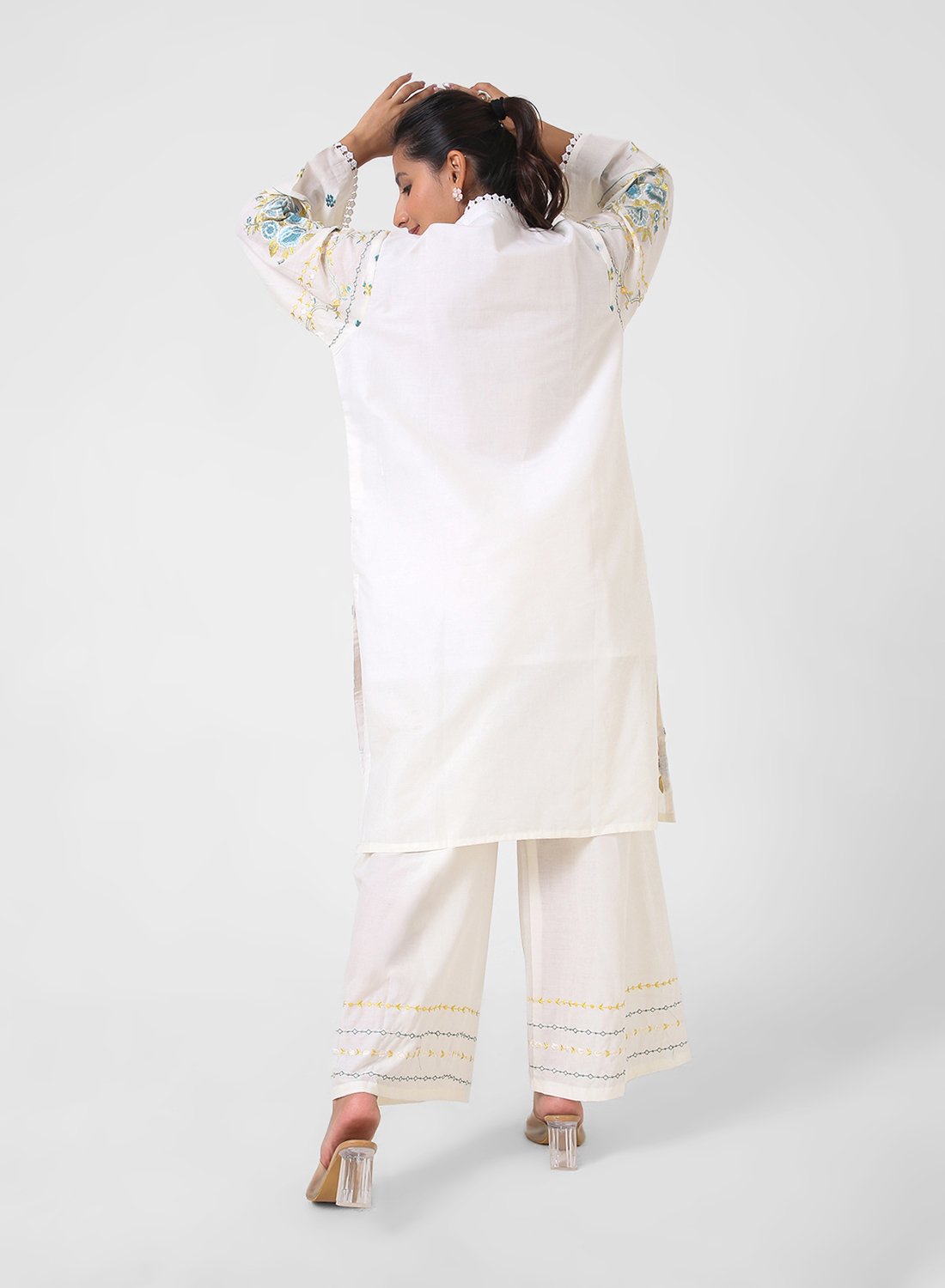 ivory embroidered kurta set, cotton kurta palazzo for women, mandarin collar kurta, breathable summer ethnic wear, floral threadwork kurta, wide‑leg palazzo co‑ord, everyday office wear set.