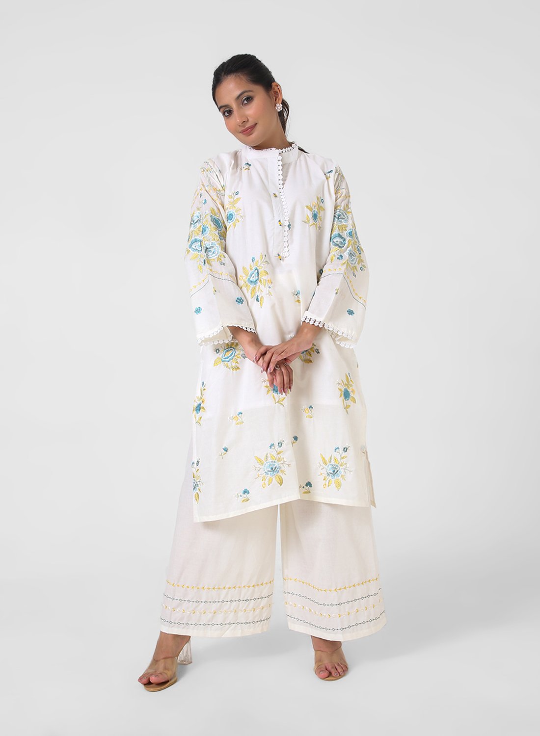 ivory embroidered kurta set, cotton kurta palazzo for women, mandarin collar kurta, breathable summer ethnic wear, floral threadwork kurta, wide‑leg palazzo co‑ord, everyday office wear set.