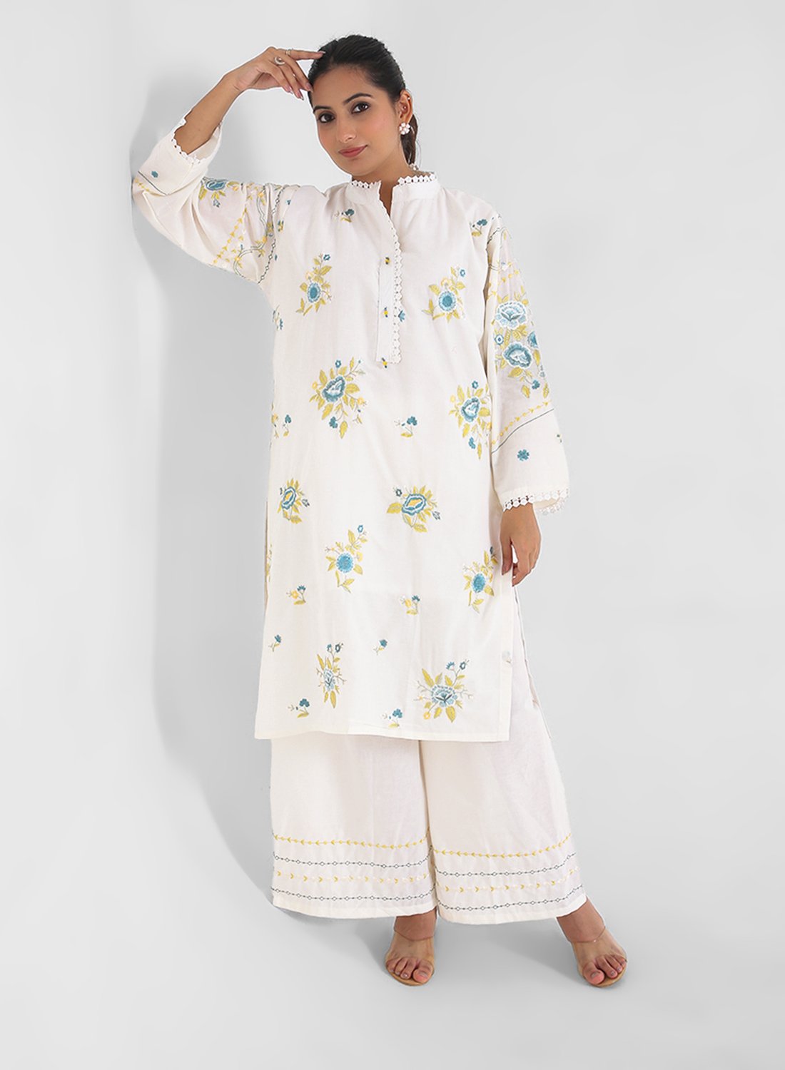 ivory embroidered kurta set, cotton kurta palazzo for women, mandarin collar kurta, breathable summer ethnic wear, floral threadwork kurta, wide‑leg palazzo co‑ord, everyday office wear set.