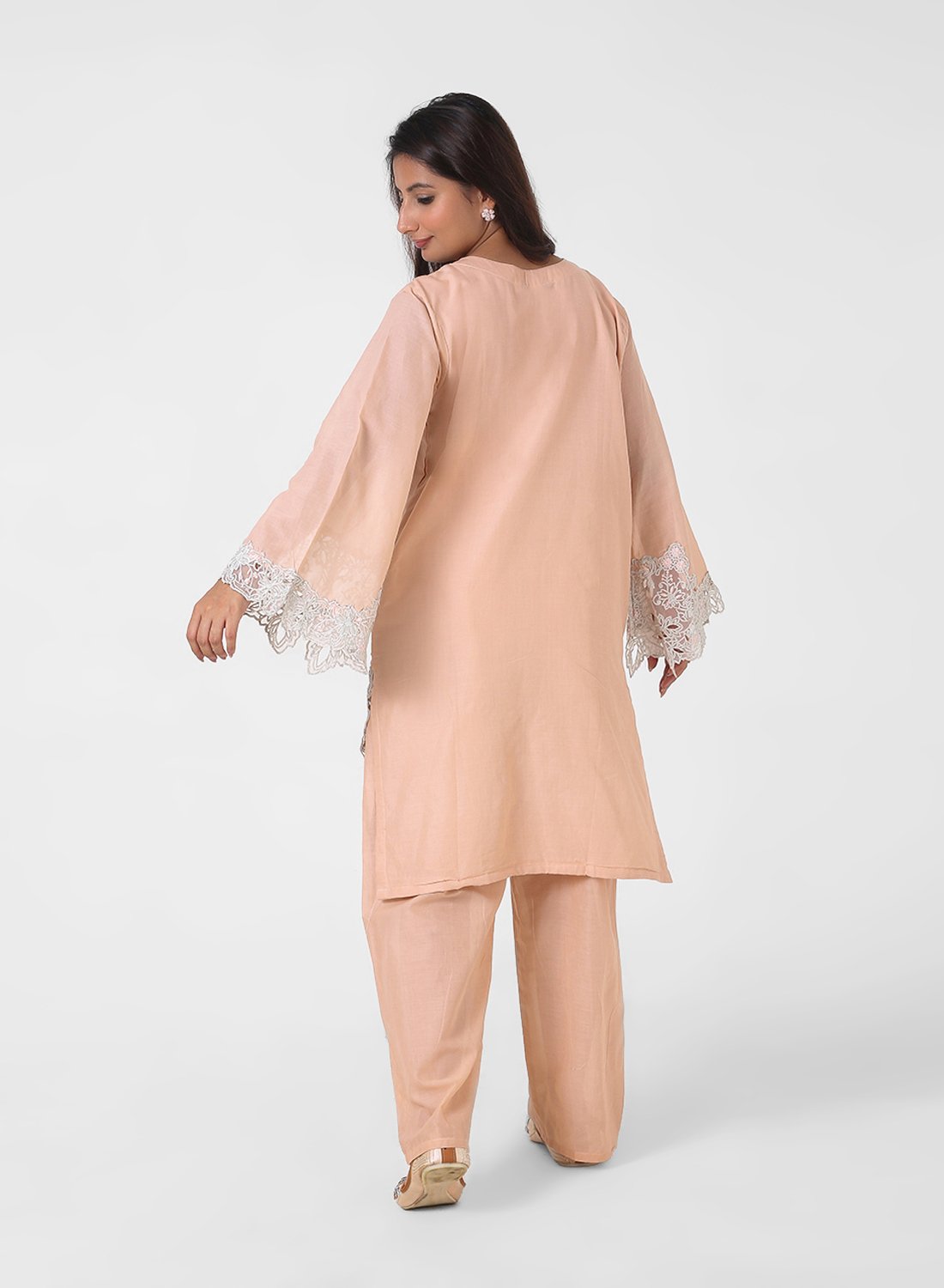 peach lace kurta set, embroidered cotton kurta pants, women’s occasion wear suit, scalloped lace hem kurta, pastel festive outfit, straight fit kurta set, elegant ethnic set for women.