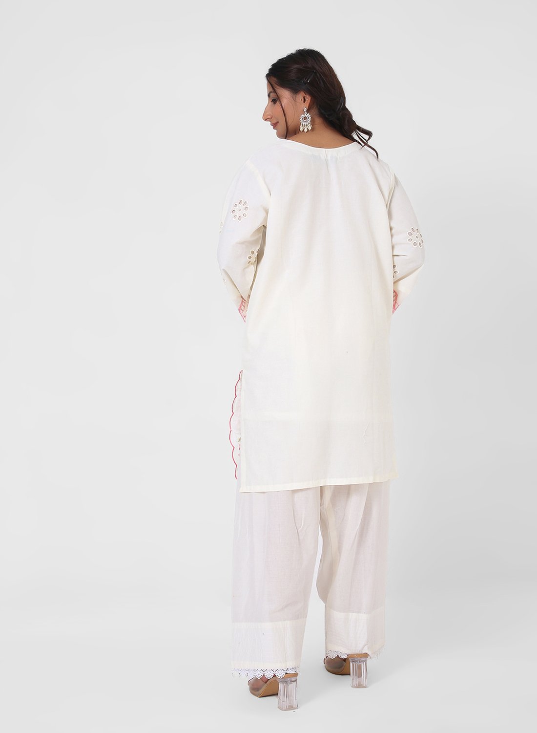 ivory embroidered suit set, cotton kurta pant dupatta, eyelet cutwork kurta, pink floral threadwork suit, breathable summer ethnic wear, straight fit kurta set, pastel festive outfit for women.