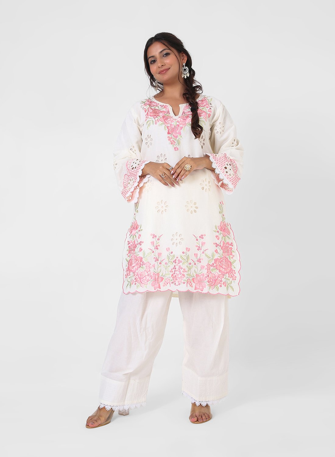 ivory embroidered suit set, cotton kurta pant dupatta, eyelet cutwork kurta, pink floral threadwork suit, breathable summer ethnic wear, straight fit kurta set, pastel festive outfit for women.