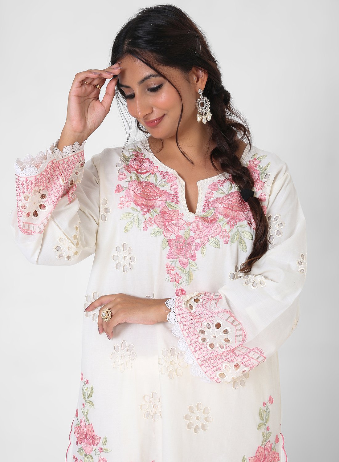 ivory embroidered suit set, cotton kurta pant dupatta, eyelet cutwork kurta, pink floral threadwork suit, breathable summer ethnic wear, straight fit kurta set, pastel festive outfit for women.